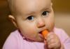 What role does carrot play in the nutrition and feeding of a child?